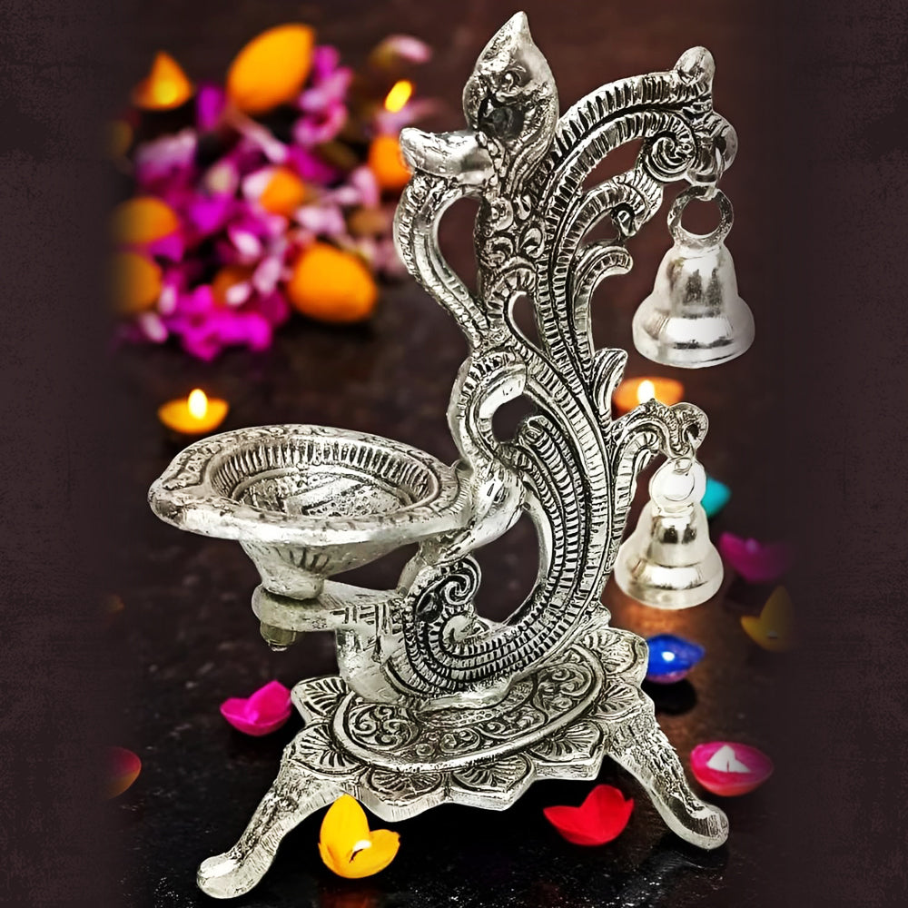 Decorative Oil Lamp Diya Stand with Bells, Antique Silver Finish, Traditional Peacock Design